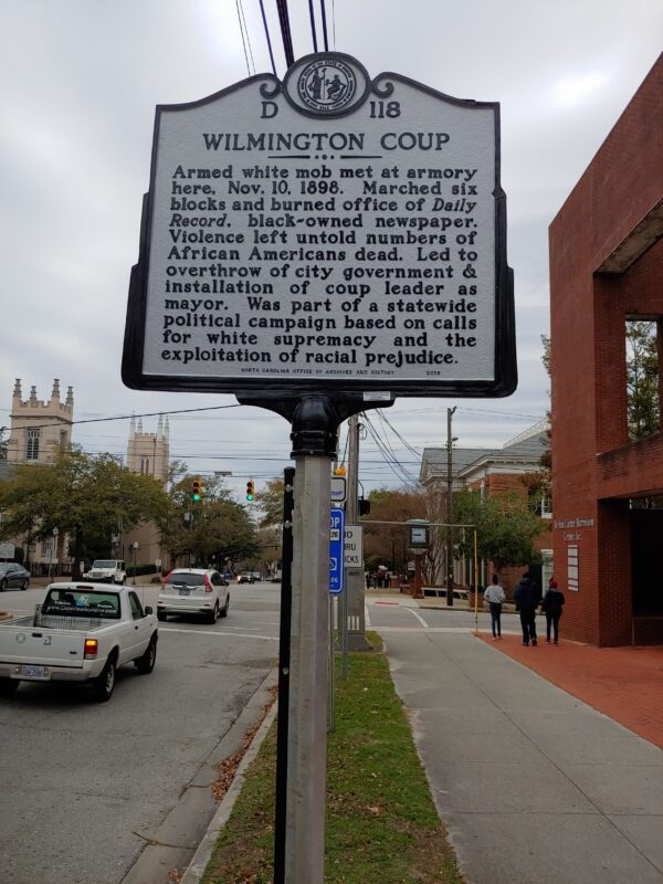 A large black and white sign that reads 