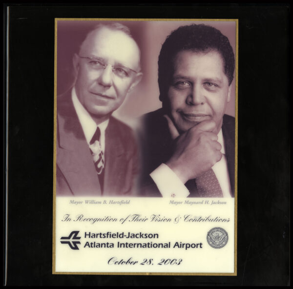 A plaque that includes the images of Mayor Hartsfield and Mayor Jackson.