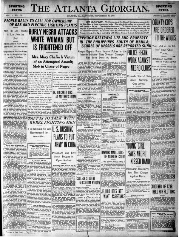 Scan of the front page of a newspaper, The Atlanta Georgian. Large headlines read: 