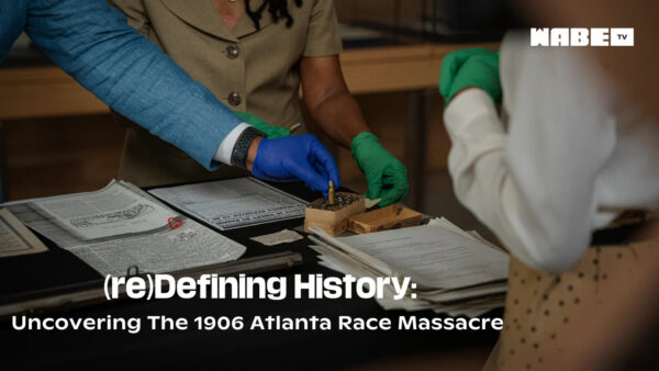 Image shows title of documentary over background image of hands examining objects and documents.